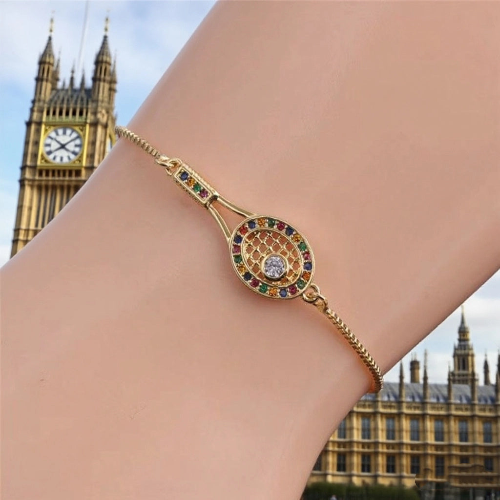 Elegant Gold Tennis Racket Charm Bracelet with Sparkling Rhinestone Detail