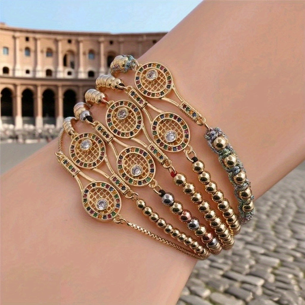Elegant Gold Tennis Racket Charm Bracelet with Sparkling Rhinestone Detail